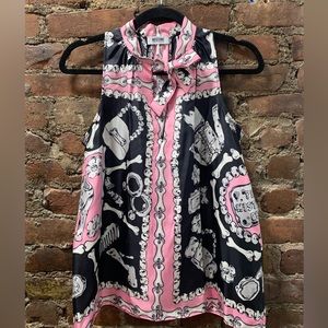 Vintage 90’s Moschino blouse. Can be tied at neck or have hang freely. Pristine.